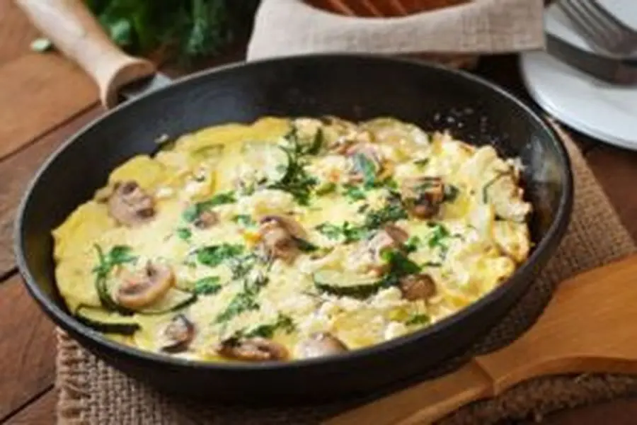 Przepis na Frittata z cukinią, serem i pieczarkami. Czyli Jak ugotować i jak przygotować Frittata z cukinią, serem i pieczarkami.